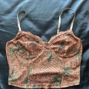 Laced netting cropped tank.